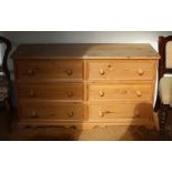 A MODERN PINE DOUBLE WIDTH CHEST OF SIX DRAWERS