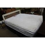 A STORAGE DIVAN BED BASE WITH 5' MATTRESS, topper & headboard