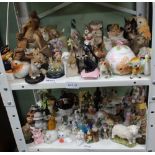 TWO SMALL SHELVES OF FIGURINES VARIOUS
