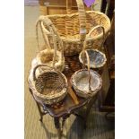 A SELECTION OF WOVEN WICKER BASKETS VARIOUS