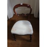A 19TH CENTURY MAHOGANY FINISHED BALLOON BACK SINGLE CHAIR with overstuffed seat pad