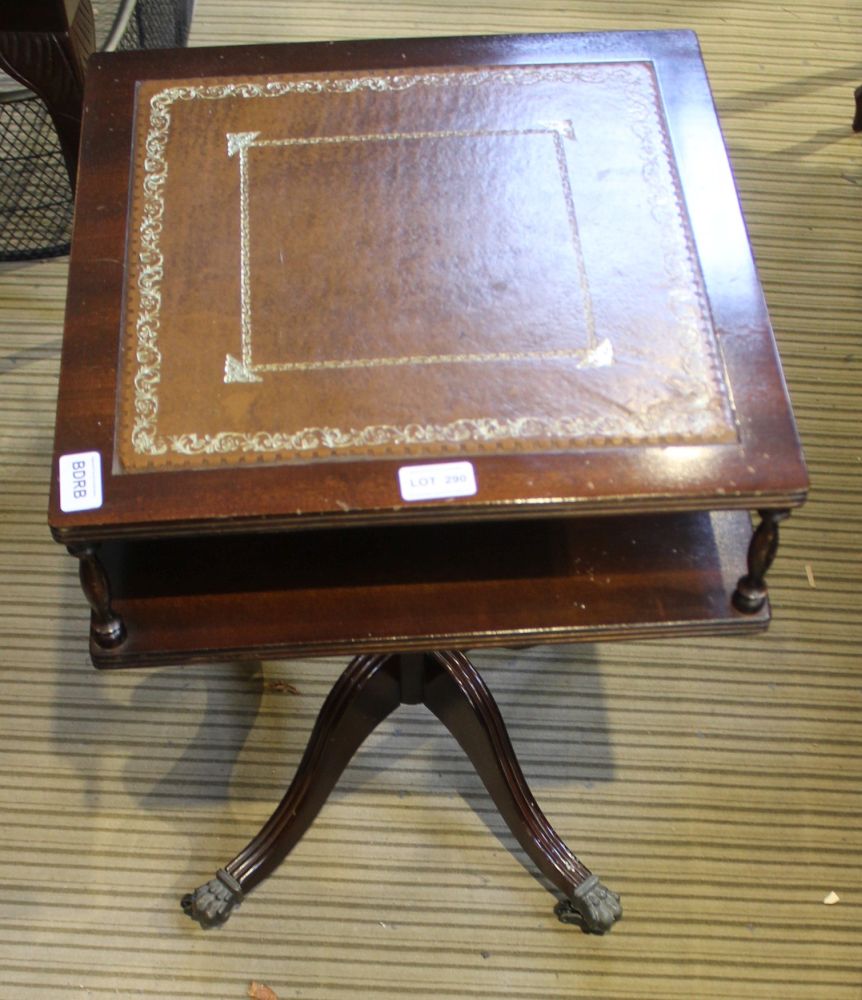 A REPRODUCTION MAHOGANY SQUARE TOPPED TABLE with skiver insert top, having storage undertier