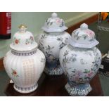 THREE LARGE PORCELAIN ORIENTAL DESIGN LIDDED JARS