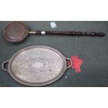 A LARGE TWIN HANDLED OVAL SILVER PLATED CHASED TRAY together with a well turned wooden handled