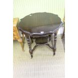 A LATE 19TH / EARLY 20TH CENTURY FANCY CIRCULAR TOPPED TABLE on ring turned and blocked legs, united