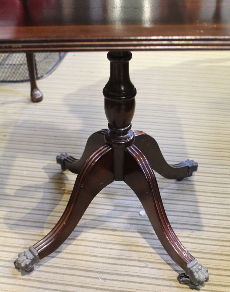 A REPRODUCTION MAHOGANY SQUARE TOPPED TABLE with skiver insert top, having storage undertier - Image 2 of 2