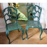 TWO GREEN PAINTED CAST METAL PATIO CHAIRS