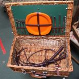 A WOVEN WICKER PICNIC BASKET plus contents