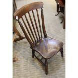 A 19TH CENTURY STICK BACK SOLID SEATED LOW CHAIR