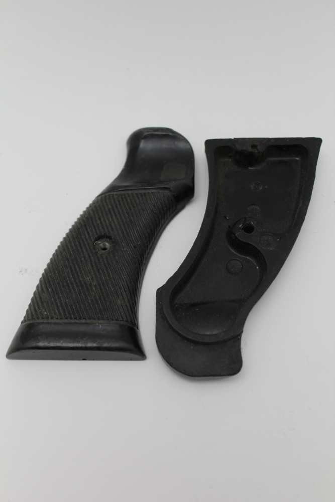 A PAIR OF PISTOL GRIPS, possibly for Webley, together with a collection of machine gun magazines - Image 6 of 6