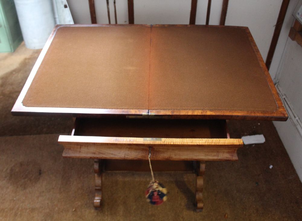 A MID-TO LATE VICTORIAN MIXED WOOD CARD/WORKTABLE having revolving fold out baize lined lid, over - Image 2 of 3