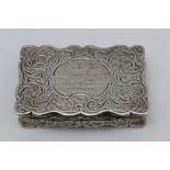 NEILL & COOK A silver snuff box, serpentine form with hinged cover, acanthus leaf engraved,