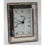 A 'HARRODS' SILVER FRAMED CLOCK, bound reed frame, Sheffield 1995, 12cm x 9cm