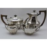 COOPER BROTHERS & SONS LTD, A FOUR PIECE SILVER TEA SET of canted Georgian design, comprising;