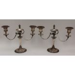 A PAIR OF OLD SHEFFIELD PLATE THREE LIGHT CANDELABRA of Adam style, twin branch form, on oval bases,