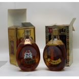 Two boxed Dimple Whisky bottles, one 70 degrees proof, 26 2/3 fl.oz, old botting, the other 40%