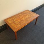 An oak tile top coffee table, marked ‘made in Denmark’ to base, 92cm x 52cm x 40cm. IMPORTANT: