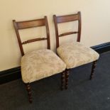 A set of four 19th century mahogany dining chairs with turned fronted legs and rope twist design