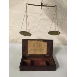 Set of small brass weight scales in wooden box. Important: Online viewing and bidding only. No in