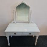 A Robert Strahan & Co. Dublin Gothic style white painted dressing table with two drawers to base.