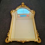 A reproduction French style gilt mirror. IMPORTANT: Online viewing and bidding only. Collection by