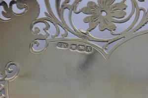 A silver card tray with pierced floral decoration, with marks for Sheffield 1955 and Viner's Ltd ( - Image 2 of 5