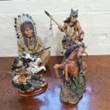 Three Native American figures to include chief and two warriors and a cowboy on horseback.