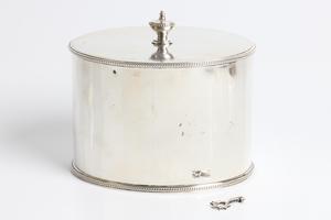 A George III silver tea caddy of plain oval form with urn finial to top, lock and original key, with - Image 4 of 4