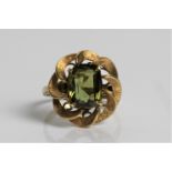 A chrysoberyl dress ring, marked 18ct gold, ring size N 1/2, approx. weight 4.8gms. Important: