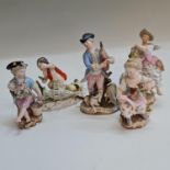 Five Meissen figurines including boy fishing, girl and boy with flowers, woman with seashell pot and