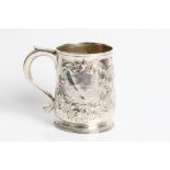 A George II silver tankard with later floral decoration and engraved presentation for Bruton