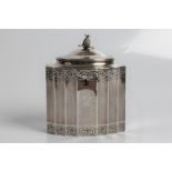 A George III silver tea caddy with lion to front, stag to back and pineapple finial, with marks