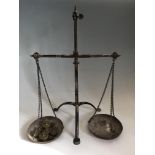 Set of weighing scales with nine weights. Important: Online viewing and bidding only. No in person