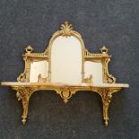 An onyx and brass wall mounted mirror back shelf unit. IMPORTANT: Online viewing and bidding only.