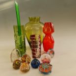 Approx. 15 glass paperweights, with five coloured studio glass vases. IMPORTANT: Online viewing