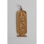 An Egyptian hieroglyph pendant, marked 9ct gold, approx. weight 5.0gms. Important: Online viewing