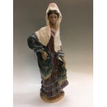 A Lladro gres figure of Spanish female, approx. height 54cm. Important: Online viewing and bidding