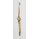 A Lady's Omega wrist watch on bracelet strap, marked 585, approx. weight of watch 22.83gms.