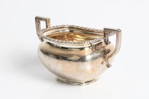 A silver twin handled sugar bowl with marks for Chester 1921/22, approx. weight 260gms. Important: - Image 3 of 3