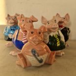 Wade NatWest piggy bank family of five. Important: Online viewing and bidding only. No in person