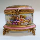 A French ormolu hand painted porcelain perfume box featuring courting scene on pink background