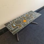 A mid century Belgian tile top coffee table designed by Adri Belarti, 121cm x 46cm x 41cm.