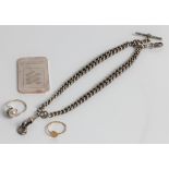 A silver ingot, approx. weight 31.6gms, and a silver Albert watch chain. approx. weight 42gms, a