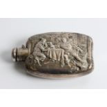 A stamped to bottom sterling hip flask with two gents in tavern to front, approx. weight 134.7gms.