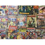 A collection of various mixed comics and magazines, including Batman, Spider-Man, Eerie, Conan,