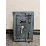 A Thomas Withers & Sons West Bromwich grey painted safe with key. IMPORTANT: Online viewing and