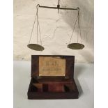 Set of small brass weight scales in wooden box. IMPORTANT: Online viewing and bidding only. No in