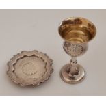 A Victorian silver miniature communion set, comprising a chalice and wafer tray, both featuring