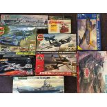A selection of various boxed construction model toys including Airfix HMS Ark Royal, planes and car,