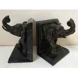 *A pair brass elephants mounted of black marble bookends, height 17cm. IMPORTANT: Online viewing and